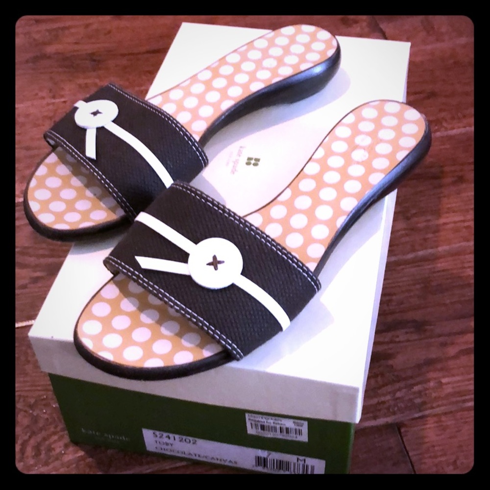 Brown Kate Spade chocolate and white slides
